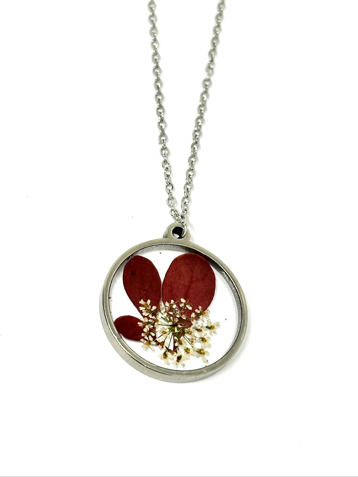 Runt halsband med höstlöv